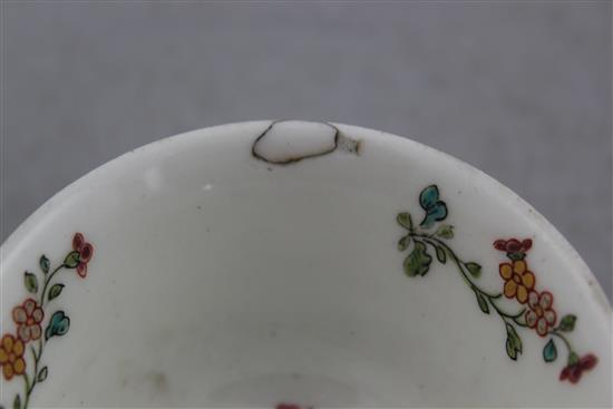 An unusual English soft paste porcelain polychrome teabowl and saucer, possibly Longton Hall c.1755-60, 12.4cm., repair to rim of teabo